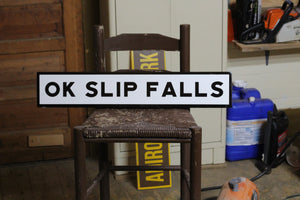 OK SLIP FALLS SIGN